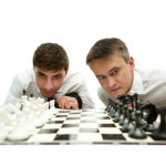 brothers playing chess