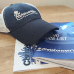 Christensens Hat with Christensen's Plant and Hardscape Center Catalogs