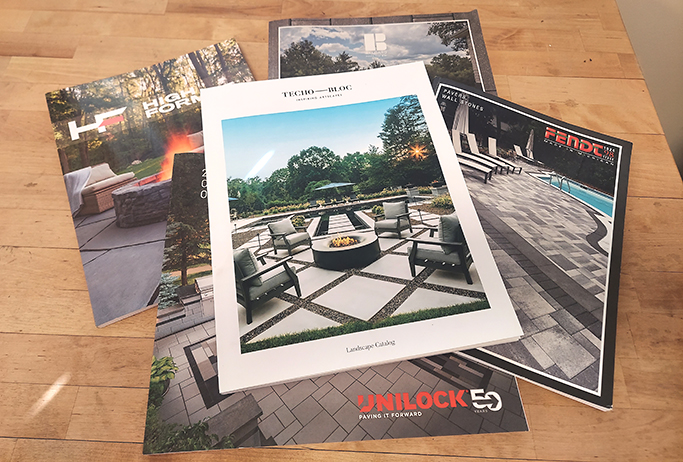 High Format, Belgard, Fendt, Unilock and Techo-Bloc Catalogs on Counter