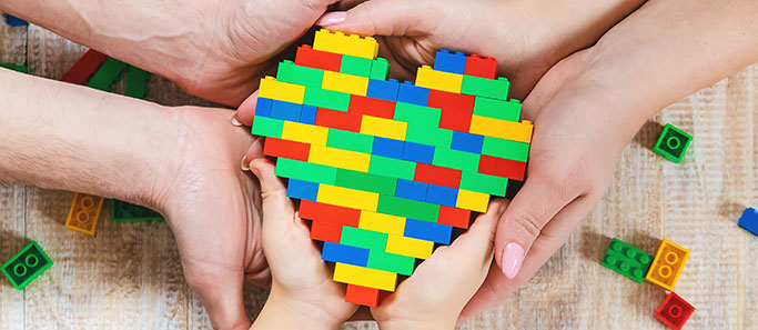Hands Holding a Lego Heart